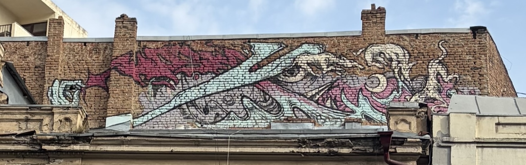 Graffiti artwork opposite Rustaveli Bus stop Tbilisi